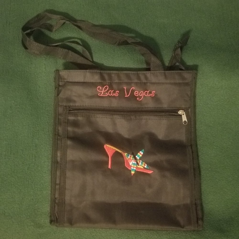 black embroidered Las Vegas purse with pockets